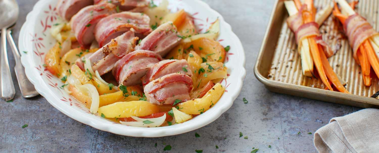 Recipes - Bacon-Wrapped Pork Tenderloin with Apples and Onions - Applegate