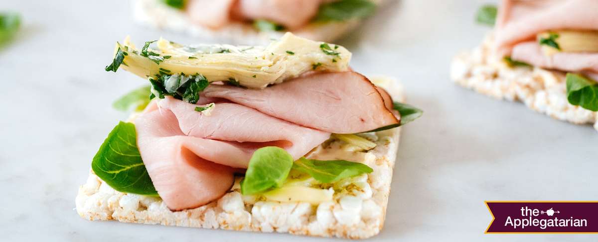 Rice cakes topped with Black Forest Ham with Herbed Artichokes and Baby Lettuces