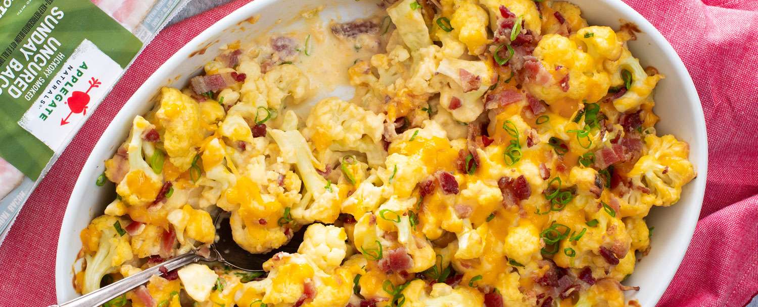 Cheesy Cauliflower with bacon in a baking dish